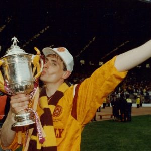 Motherwell's Tom Boyd celebrates the historic victory (copyright: The Herald)